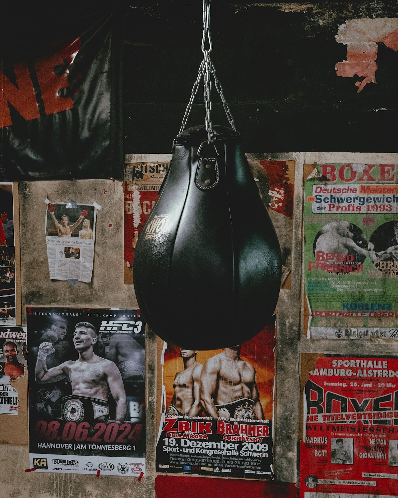 A heavy bag hanging in a boxing gym